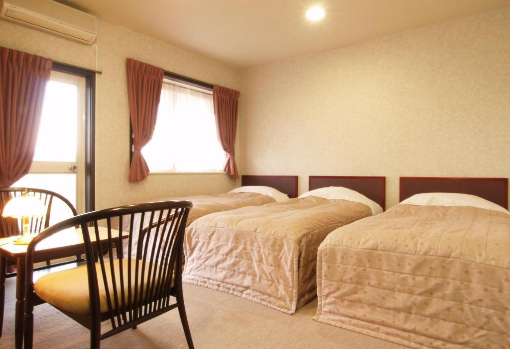 Akakura Yours Inn Myoko Quarto foto